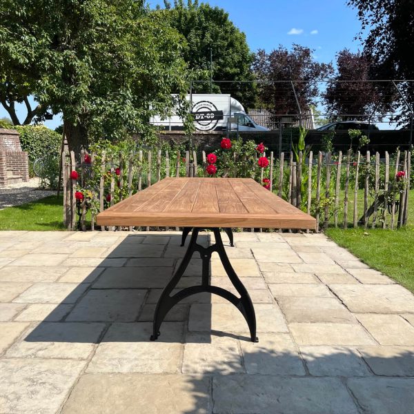 Industrial design garden table with cast iron legs and teak top T09