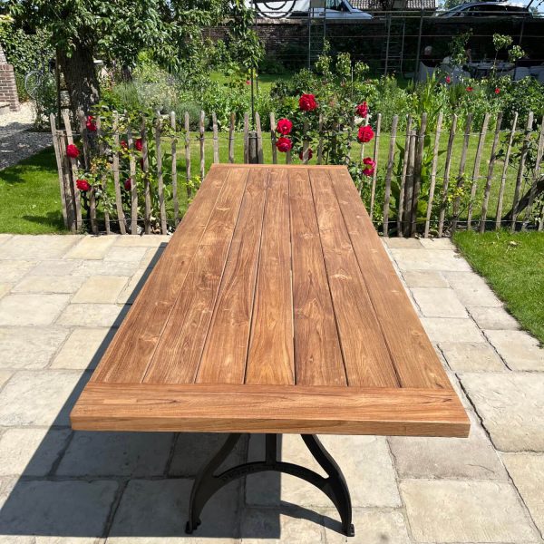 Industrial design garden table with cast iron legs and teak top T09