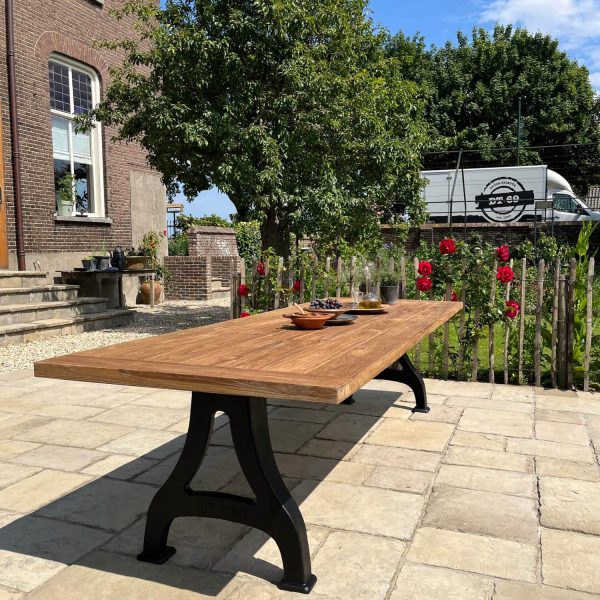 Industrial design garden table with cast iron legs and teak top T12