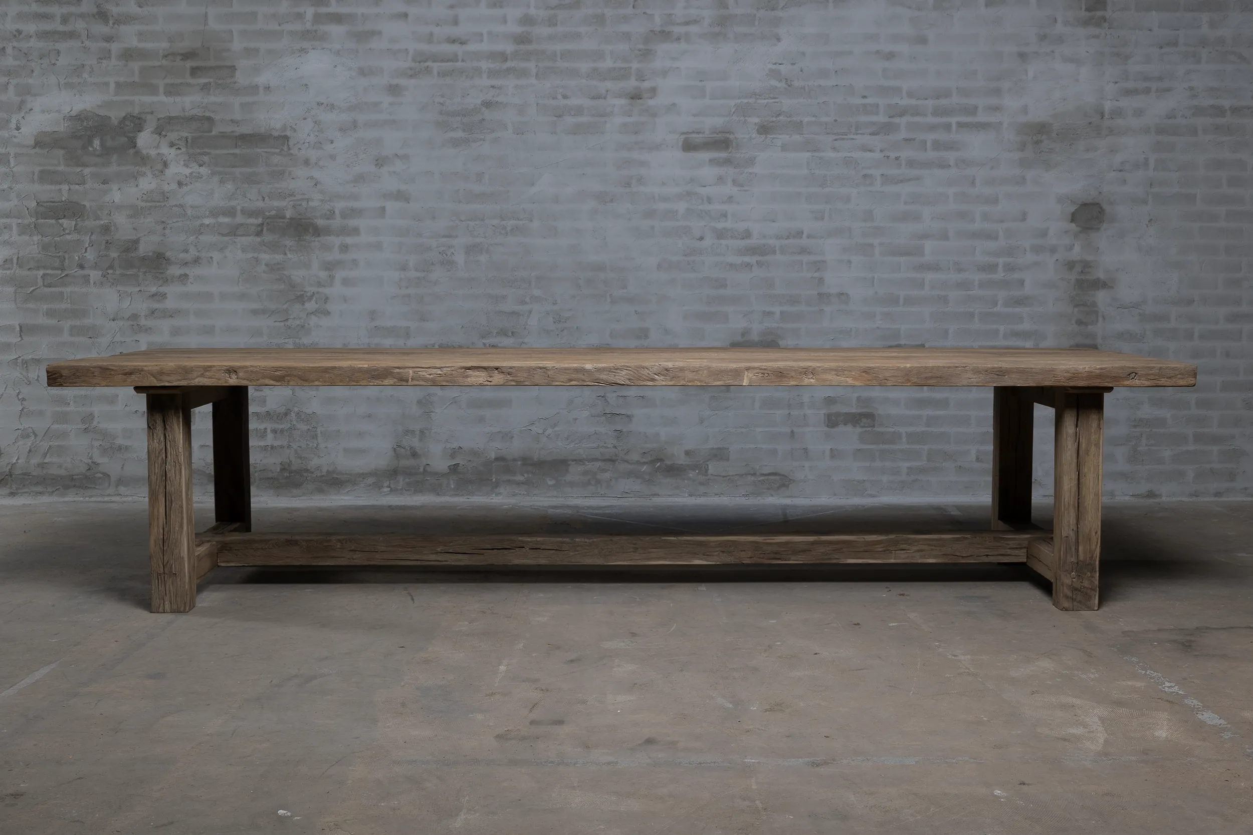 Side view of Z027-M Ulm refectory table made of solid oak.
