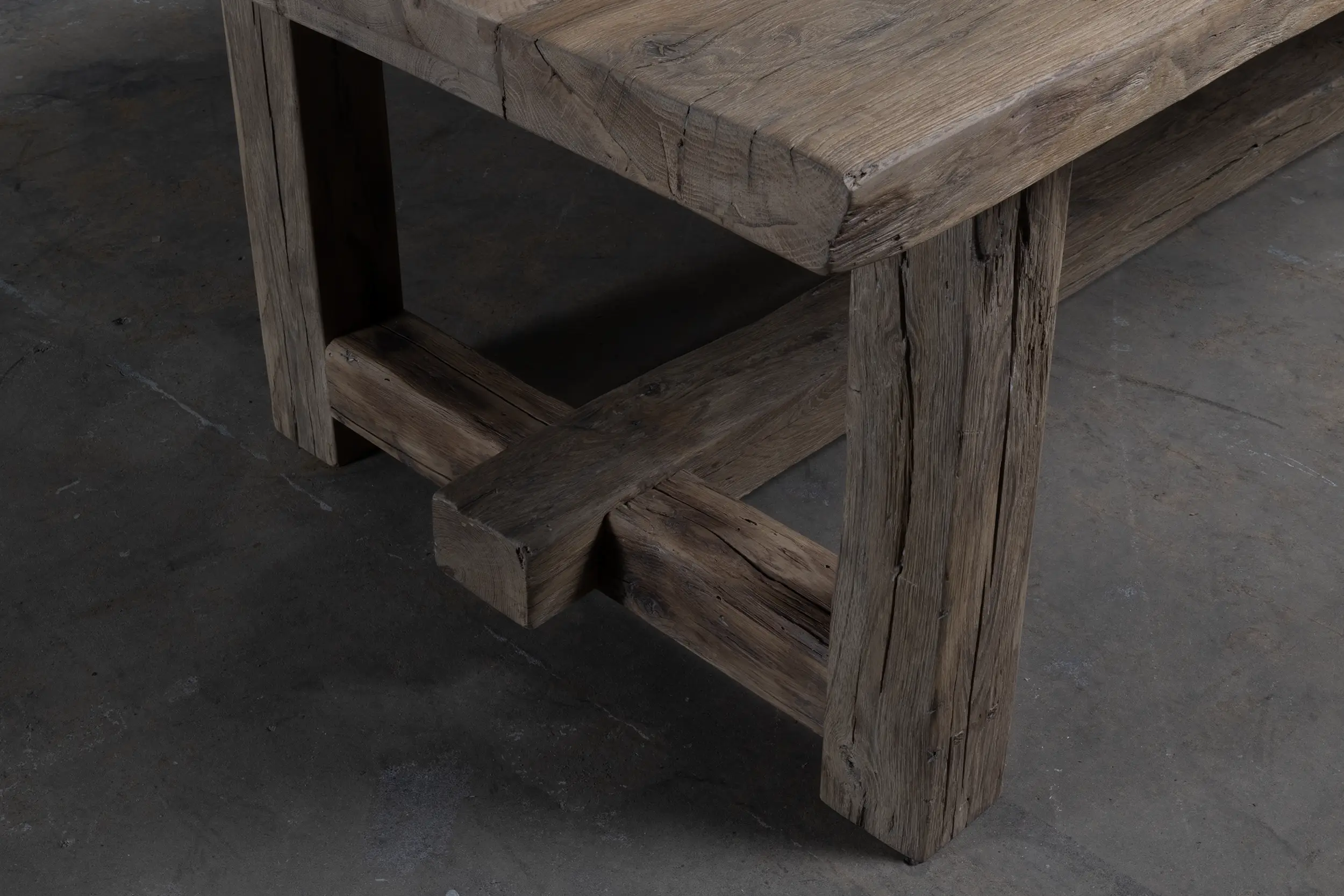 Closeup of table legs of the Z027-M Ulm refectory table made of solid old oak.