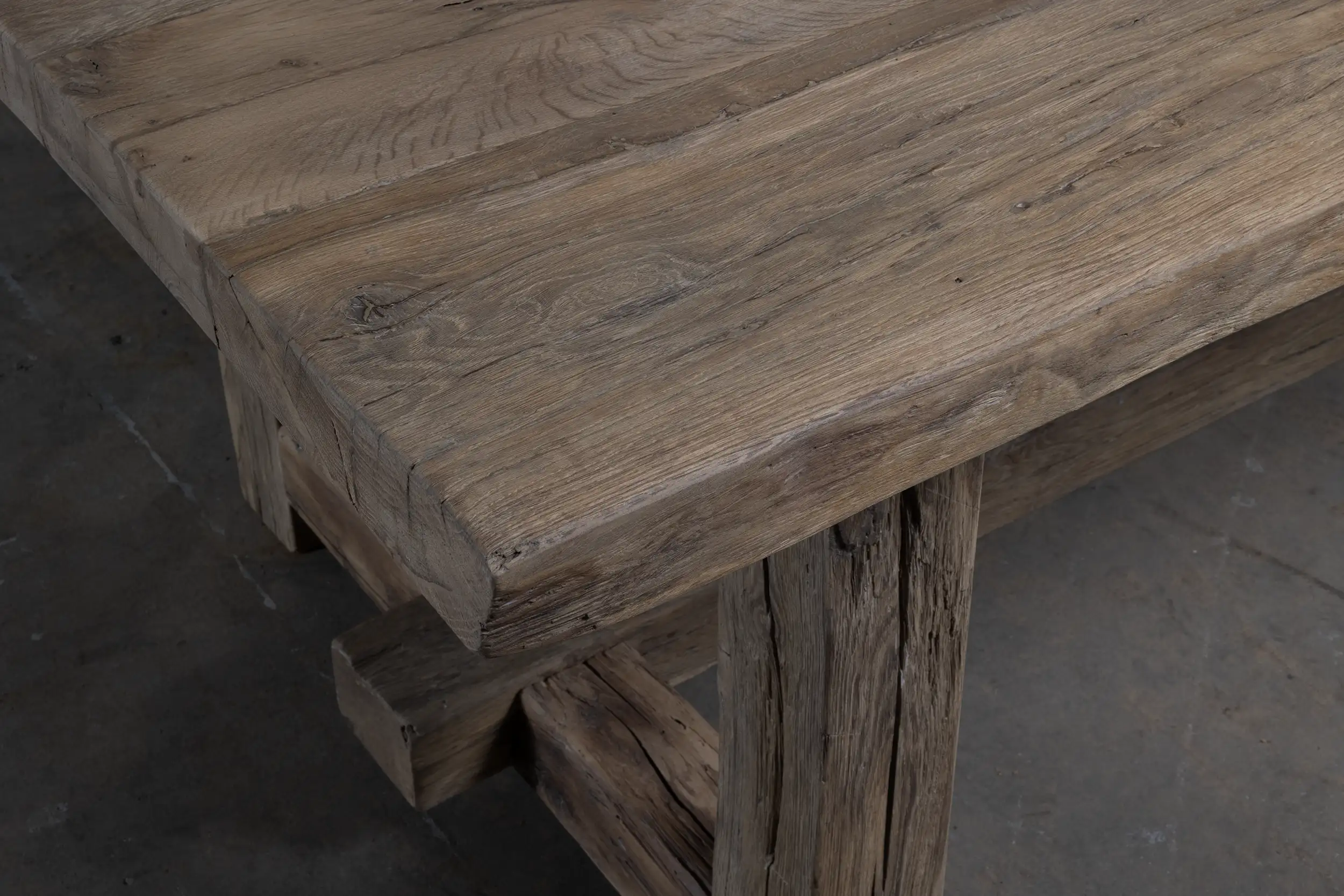 Closeup of table legs of the Z027-M Ulm refectory table made of solid old oak.
